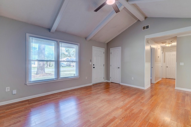 interior space featuring lofted ceiling with beams, ceiling fan, and light hardwood / wood-style floors