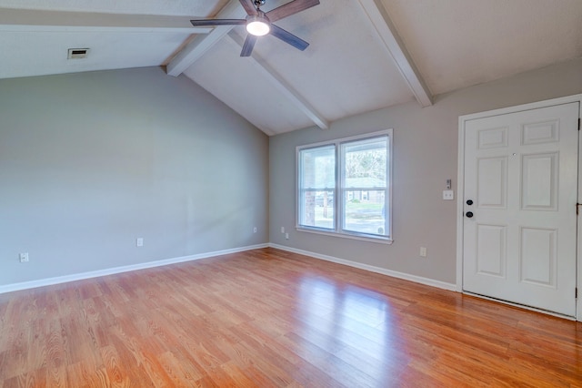 interior space with light hardwood / wood-style floors, vaulted ceiling with beams, and ceiling fan