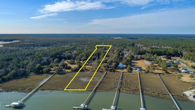 0 Doar Rd, Awendaw, SC 29429 - aerial view of property and surrounding area with a heavily wooded area, property parcel outlined, and a nearby body of water