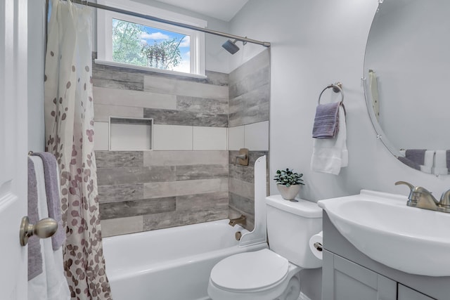 bathroom with vanity, toilet, and shower / bath combo