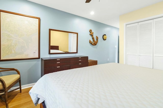 818 Club Cottage Ct, Edisto Beach, SC 29438 - bedroom featuring light wood-style floors, a closet, baseboards, recessed lighting, and a ceiling fan