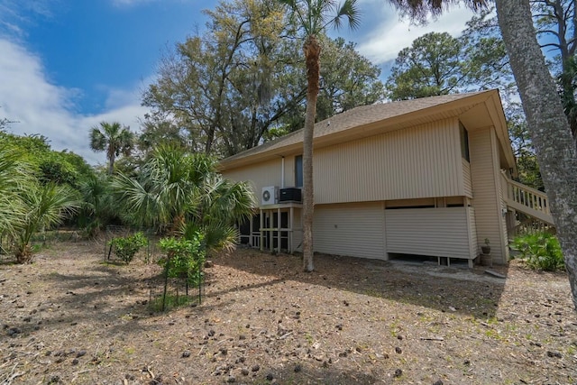 818 Club Cottage Ct, Edisto Beach, SC 29438 - back of property featuring roof with shingles