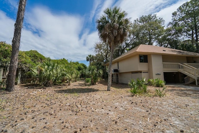 818 Club Cottage Ct, Edisto Beach, SC 29438 - view of side of property featuring stairway