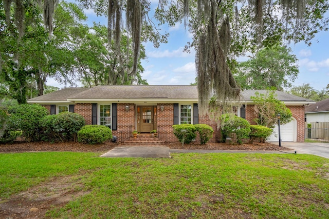 614 Beauregard St, Charleston, SC 29412 - ranch-style house featuring an attached garage, driveway, brick siding, and a front lawn