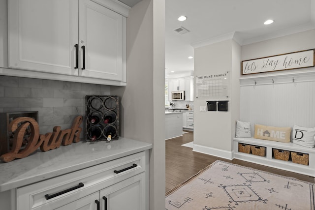 4019 Cascades Thrust, Summerville, SC 29483 - mudroom with ornamental molding, recessed lighting, visible vents, and dark wood finished floors