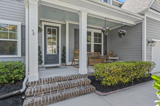 4019 Cascades Thrust, Summerville, SC 29483 - doorway to property featuring covered porch and a garage