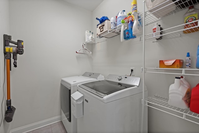 4019 Cascades Thrust, Summerville, SC 29483 - washroom with washing machine and dryer, tile patterned flooring, baseboards, and laundry area