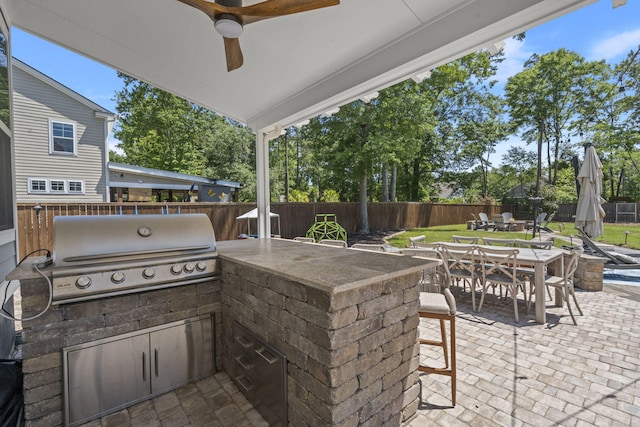 4019 Cascades Thrust, Summerville, SC 29483 - view of patio with a ceiling fan, outdoor dining space, area for grilling, a fenced backyard, and grilling area