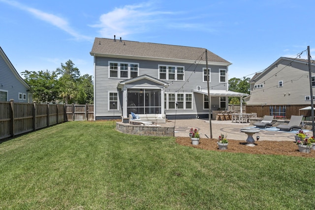 4019 Cascades Thrust, Summerville, SC 29483 - rear view of property featuring a fenced backyard, a sunroom, a patio, and a lawn