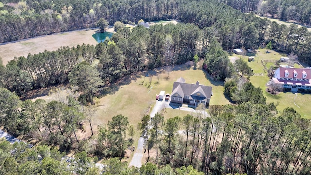 aerial view featuring a forest view