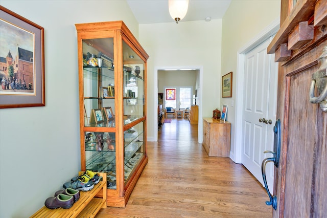 hall with light wood-type flooring