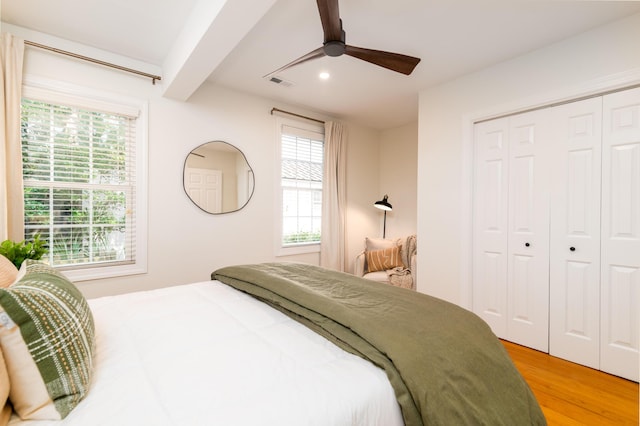 31 Lyttleton Ave, Charleston, SC 29407 - bedroom featuring light wood-style floors, multiple windows, beam ceiling, a closet, and recessed lighting