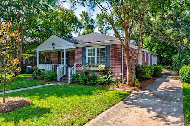 31 Lyttleton Ave, Charleston, SC 29407 - bungalow-style home featuring brick siding, covered porch, concrete driveway, a front yard, and roof with shingles