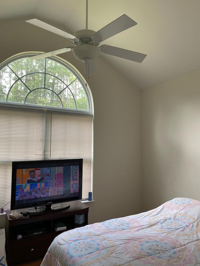 bedroom with ceiling fan and lofted ceiling