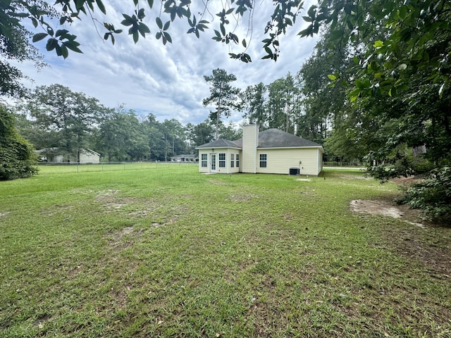 view of yard featuring fence