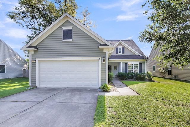 view of front of house with concrete driveway, a garage, roof with shingles, and a front lawn