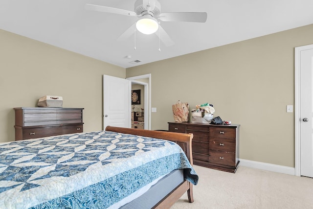 bedroom with a ceiling fan, baseboards, light colored carpet, and visible vents