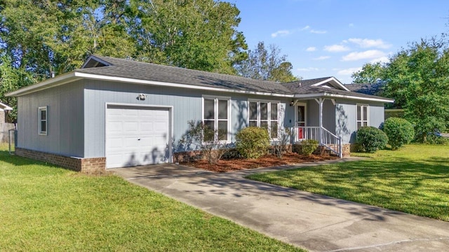 ranch-style house featuring a garage and a front yard