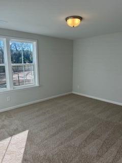 view of carpeted spare room