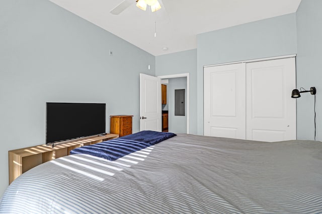 bedroom featuring ceiling fan and a closet