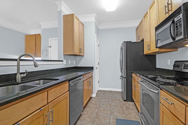 kitchen featuring light tile patterned flooring, sink, crown molding, and stainless steel appliances