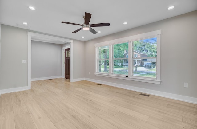 unfurnished room featuring a ceiling fan, light wood finished floors, baseboards, and recessed lighting