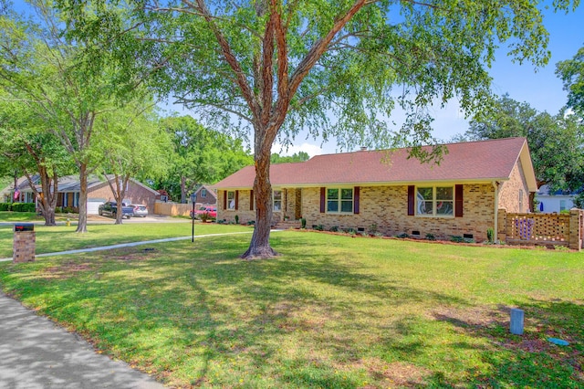 single story home featuring crawl space and brick siding