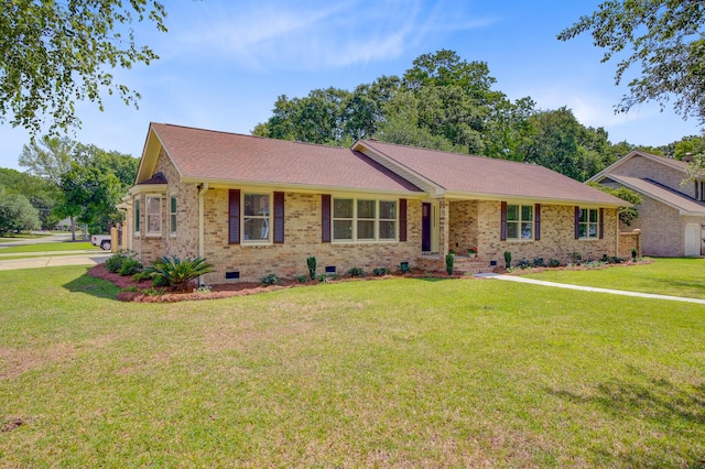 ranch-style home featuring crawl space, a front lawn, brick siding, and roof with shingles