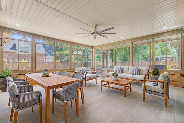 sunroom featuring wood-type flooring, floor to ceiling windows, wood ceiling, and recessed lighting