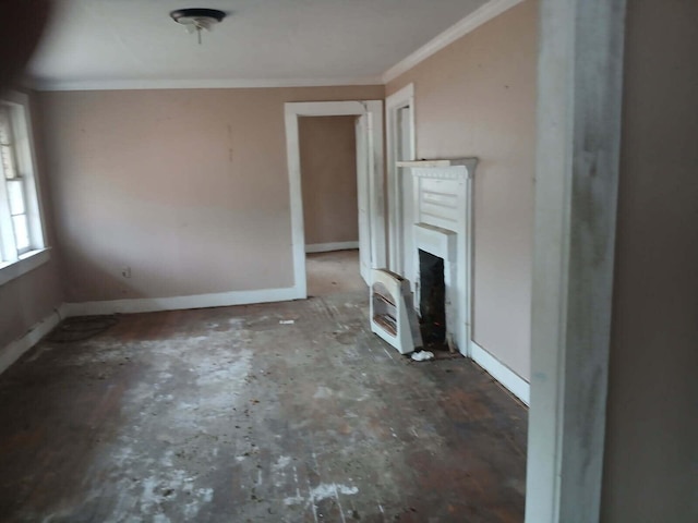 unfurnished living room featuring ornamental molding, heating unit, and a fireplace