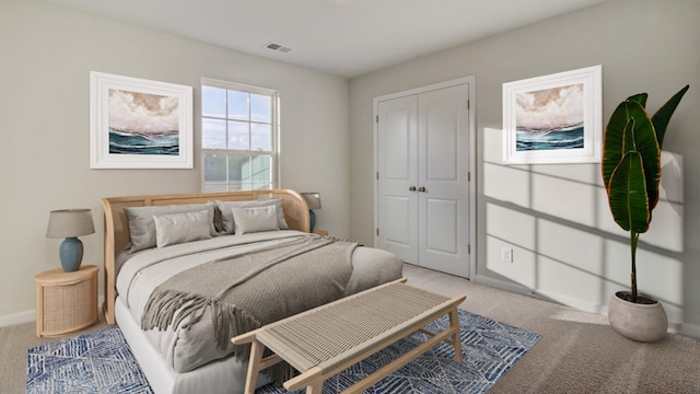 bedroom featuring light carpet and a closet