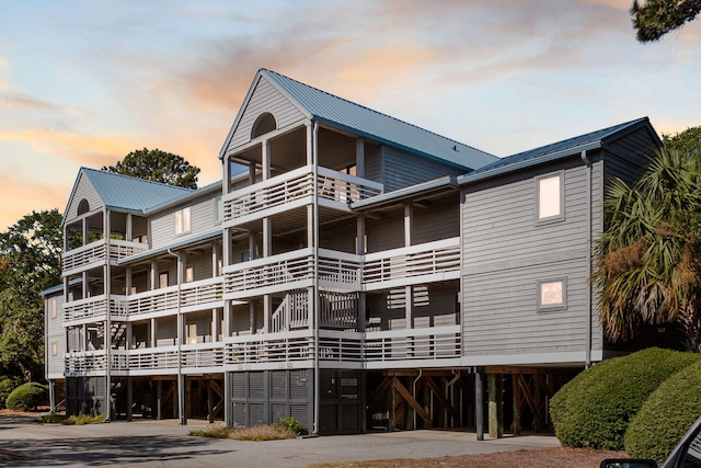 view of outdoor building at dusk