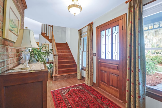 entryway with light hardwood / wood-style floors