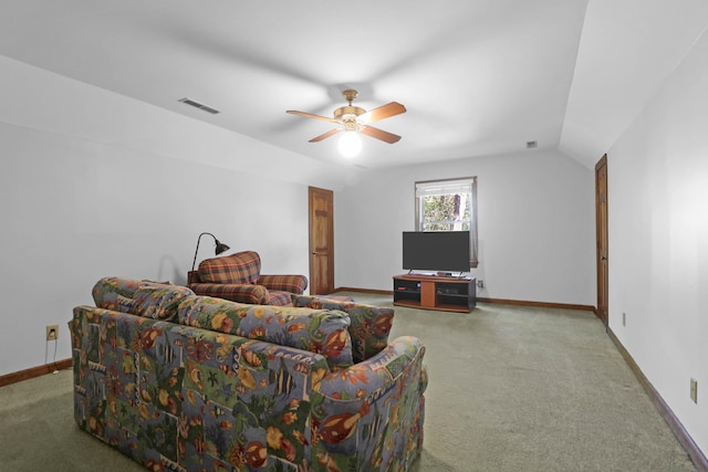 carpeted living room with lofted ceiling and ceiling fan