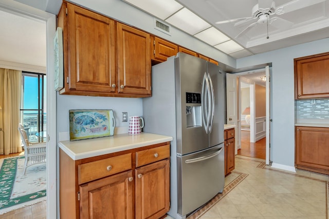 kitchen featuring stainless steel fridge and ceiling fan