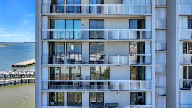 view of building exterior featuring a water view