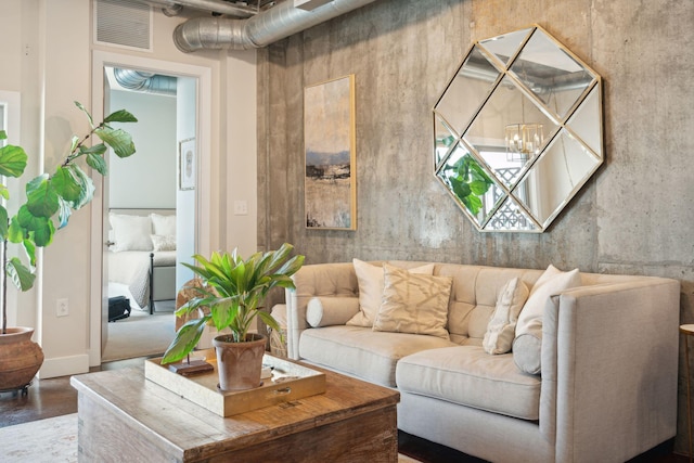 living room featuring concrete floors