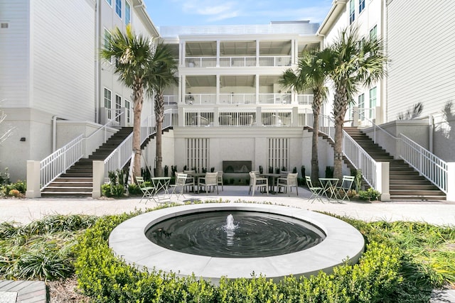 rear view of property featuring a patio area