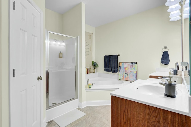 full bath with tile patterned floors, a shower stall, a bath, and vanity