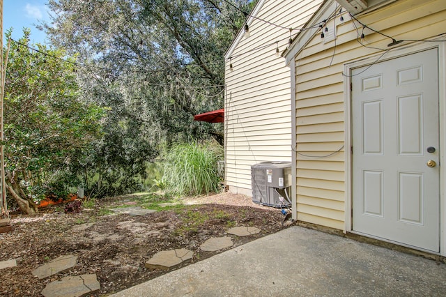 exterior space featuring central AC unit and a patio area