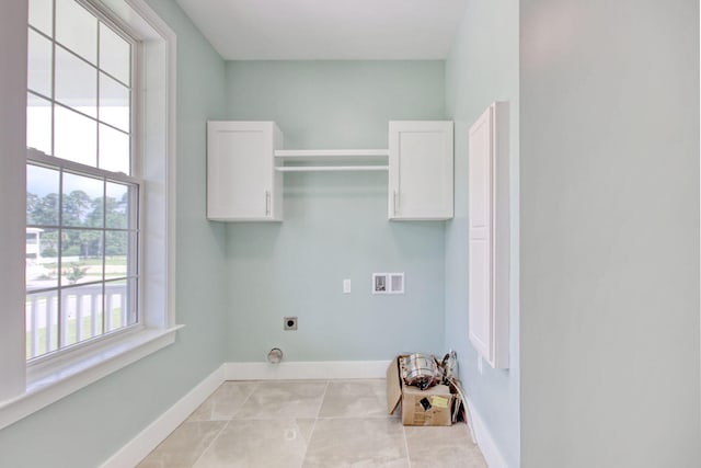 125 Oak Bay Dr, Georgetown, SC 29440 - washroom with electric dryer hookup, cabinet space, washer hookup, and tile patterned flooring