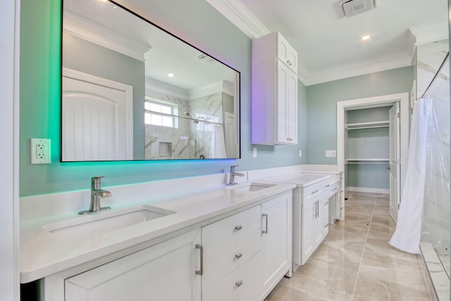 125 Oak Bay Dr, Georgetown, SC 29440 - bathroom with a marble finish shower, crown molding, double vanity, marble look tile flooring, and recessed lighting