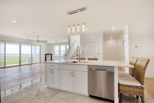 125 Oak Bay Dr, Georgetown, SC 29440 - kitchen with dishwasher, open floor plan, a kitchen island with sink, hanging light fixtures, and a ceiling fan