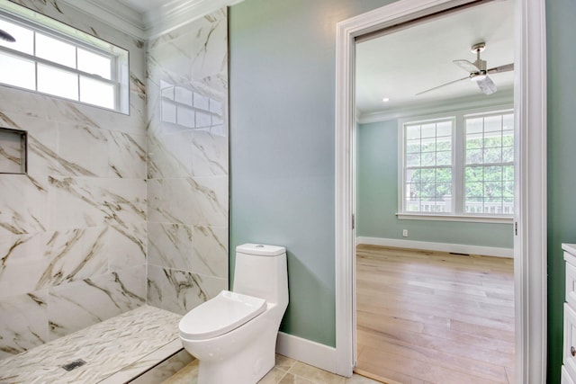 125 Oak Bay Dr, Georgetown, SC 29440 - full bath featuring healthy amount of natural light, crown molding, tiled shower, a ceiling fan, and wood finished floors