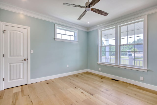 125 Oak Bay Dr, Georgetown, SC 29440 - empty room featuring crown molding, ceiling fan, and wood finished floors