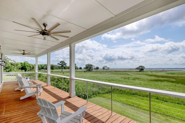 125 Oak Bay Dr, Georgetown, SC 29440 - wooden porch with a ceiling fan and a view of rural / pastoral area