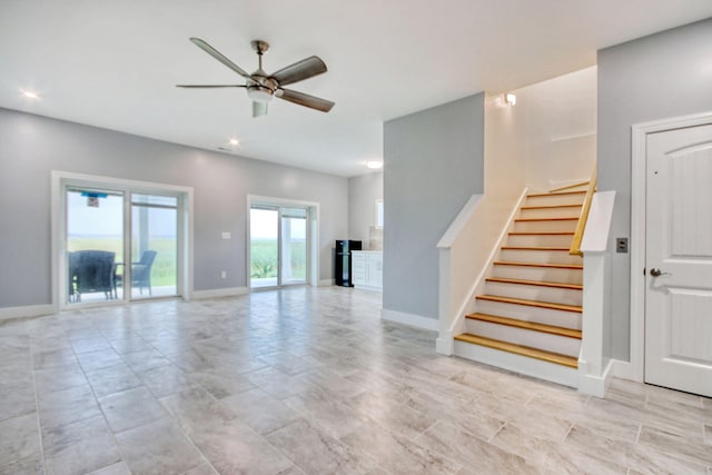 125 Oak Bay Dr, Georgetown, SC 29440 - unfurnished living room featuring ceiling fan, stairs, and recessed lighting