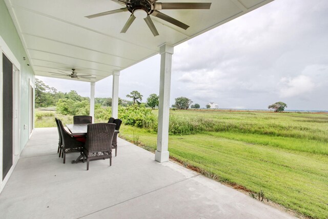 125 Oak Bay Dr, Georgetown, SC 29440 - view of patio / terrace with ceiling fan and outdoor dining area