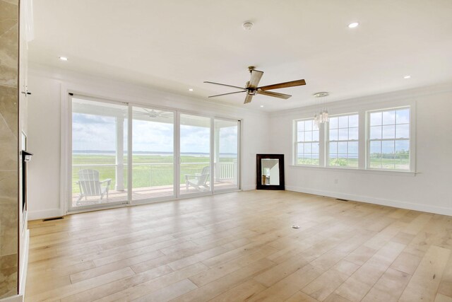 125 Oak Bay Dr, Georgetown, SC 29440 - unfurnished living room with a ceiling fan, light wood-type flooring, and recessed lighting