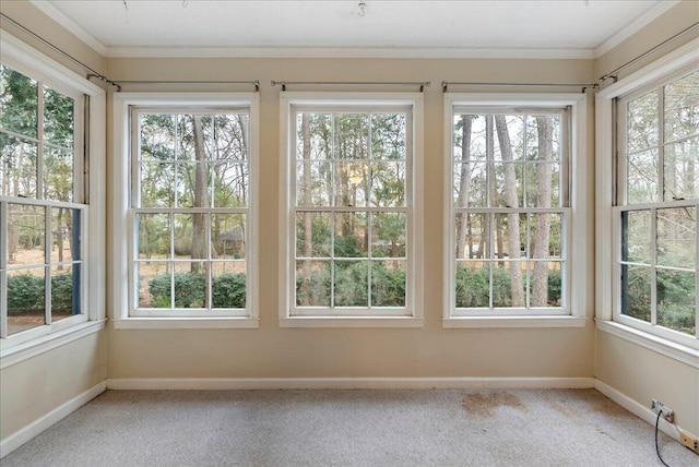 unfurnished sunroom featuring a healthy amount of sunlight